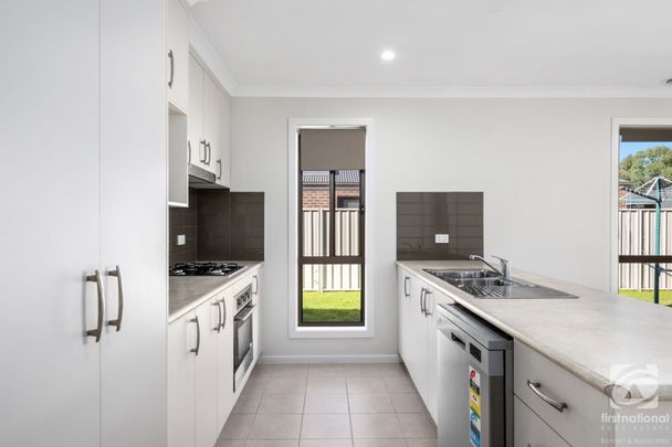 SPACIOUS 4-BEDROOM HOME WITH MODERN COMFORT - Photo 1
