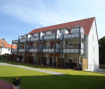 Gepflegte Erdgeschosswohnung mit Terrasse und Tiefgaragenstellplatz - Photo 1