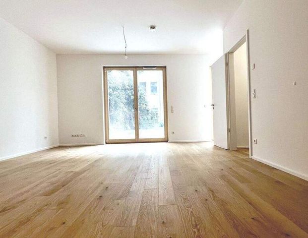 ERSTBEZUG! Tolle 2-Zi.-Maisonettewohnung mit Einbauküche, Terrasse & kleinem Garten - Foto 1