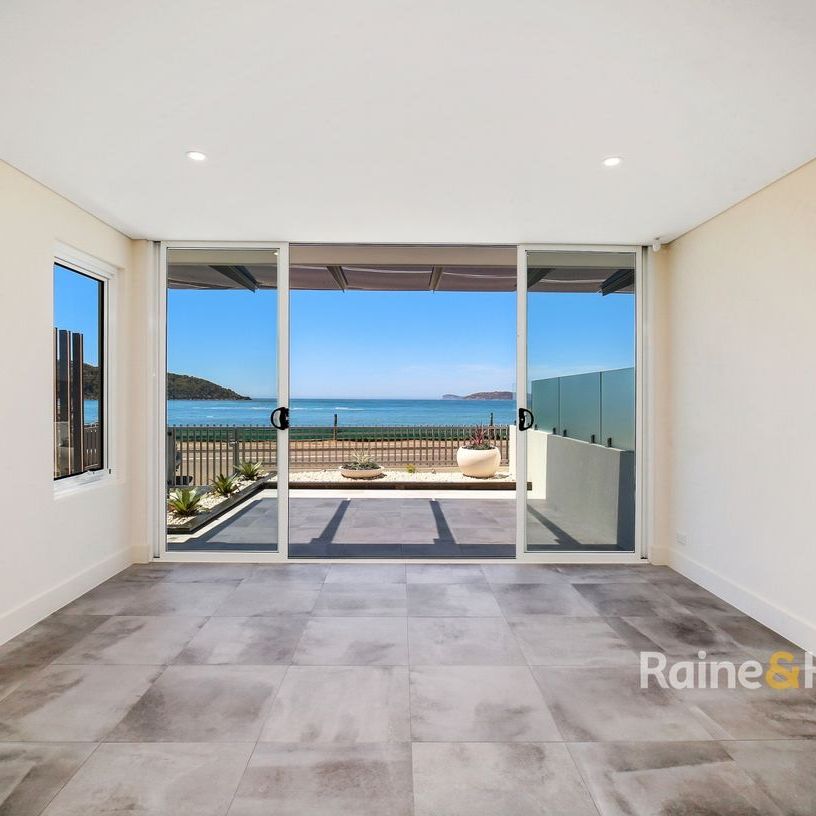 Beach Side Living! - Photo 1