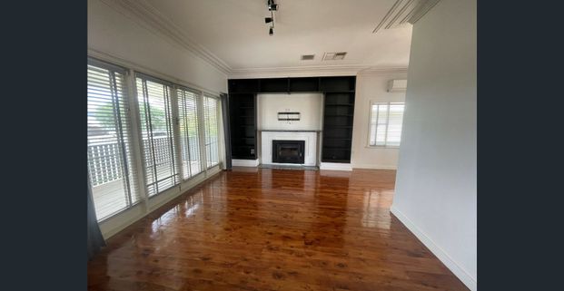 Spacious 4-Bedroom Home with Large Backyard and Outdoor Entertaining Area - Photo 1