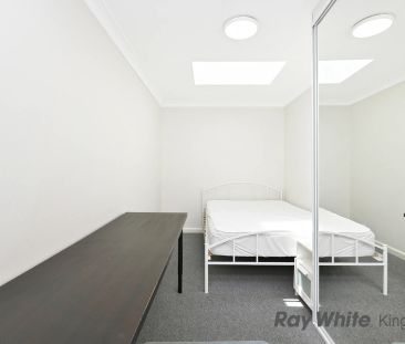 Fully Furnished Two-Bedroom Apartment with Sunroom - Photo 4