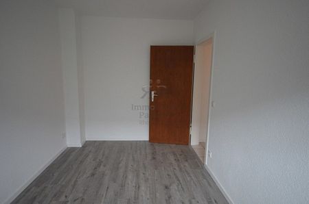 Schön renovierte und gemütliche Erdgeschosswohnung in ruhigem Haus mit neuem Bad! - Photo 4