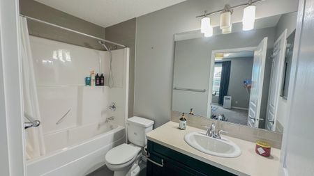 Stylish Auburn Bay Duplex With Garage & Newly Finished Basement - Photo 4