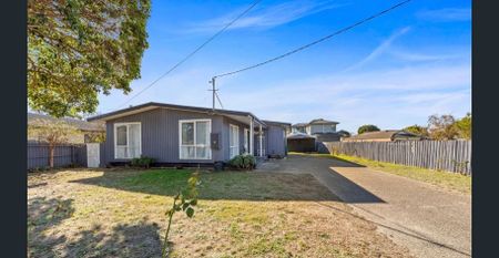 3-Bedroom Home with Dual Sheds, Minutes from Beach & Schools - Photo 2