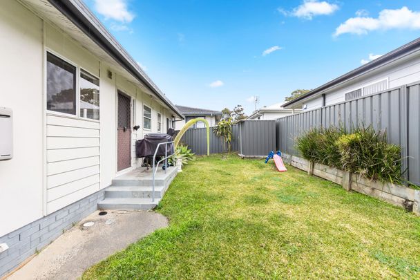 Comfortable 3 Bedroom Home in Convenient Location - Photo 1