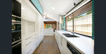 Spacious 4-Bedroom Family Home with Multiple Living Areas & Exceptional Outdoor Entertaining - Photo 4