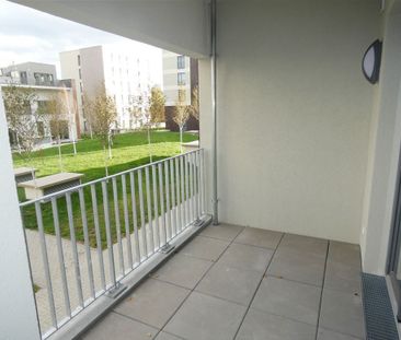 Toll geschnittene 2-Zi. Whg mit Balkon, Parkett, FBH, AR und TG! - Photo 1