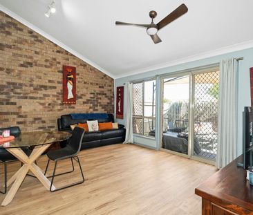 A bright unit in a peaceful complex with a sparkling residents' pool. - Photo 1