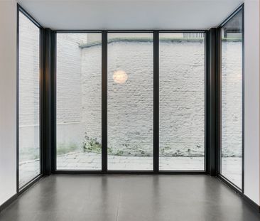 Gelijkvloers appartement met 2 slaapkamers op het Zuid met terras. - Photo 1