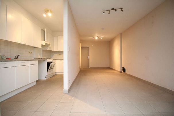 Gelijkvloersappartement met 1 slaapkamer en tuin in centrum Merksem - Photo 1