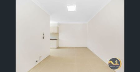 Charming and Spacious 3-bedroom Unit - Photo 3