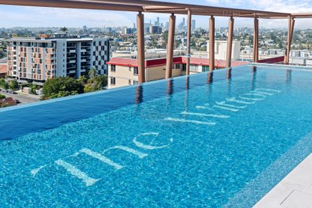 TWO BED + SMALL 3RD BEDROOM/MEDIA ROOM - Stunning Mt Cootha views at Indooroopilly’s Most Desirable New Lifestyle Address - Photo 2