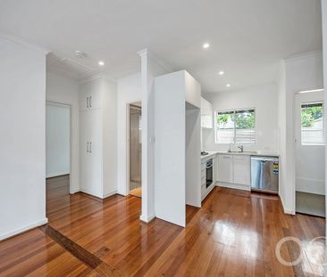 Open the Door to Light-Filled Living with a Private Courtyard Retreat - Photo 5