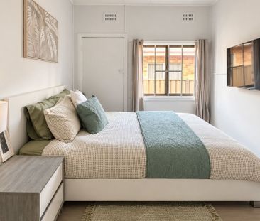 Two Bedroom Unit – Steps from the Beach! - Photo 3