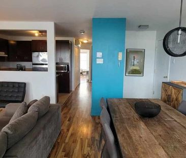 ✨ Condo 4½ à Saint-Hubert | 2 stationnements | Climatisation | Balc... - Photo 2