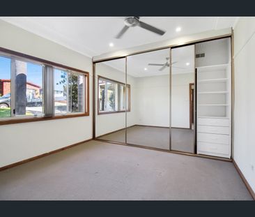 Charming Port Kembla Home with Spacious Living and Expansive Yard - Photo 6