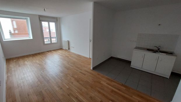 location Appartement T2 DE 45.95m² À ROMAINVILLE - Photo 1