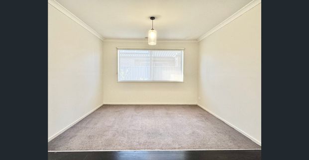 Modern Family Home in Manor Lakes! - Photo 1