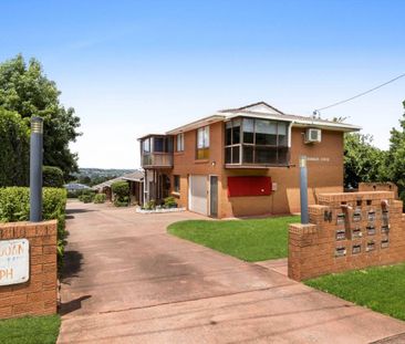 Neat & Tidy Brick Unit in Great Location - Photo 4