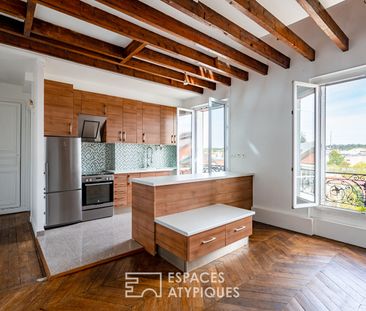 Duplex atypique en dernier étage - Photo 4