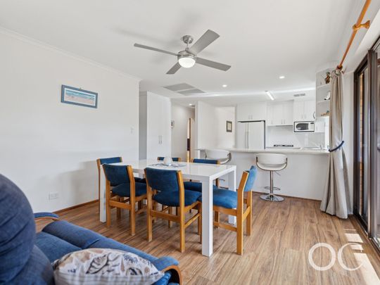 Open the Door to Easy-Care Living with Modern Comfort - Photo 1