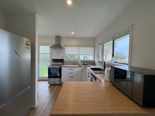 Fully Furnished End-Unit with Spacious Outdoor Living - Photo 1