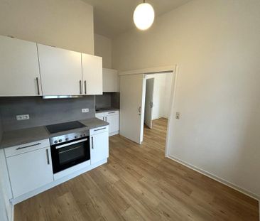 Renovierte 2-Zimmer-Wohnung mit neuer Einbauküche - Foto 4