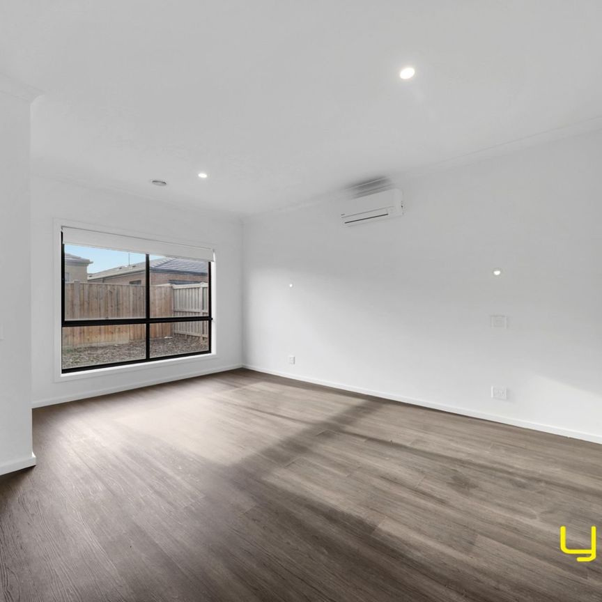 Modern & Spacious 4-Bedroom Home in a Peaceful Beveridge Location - Photo 1