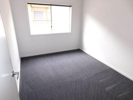 SPACIOUS THREE BEDROOM HOME CLOSE TO ALL AMENITIES - Photo 1