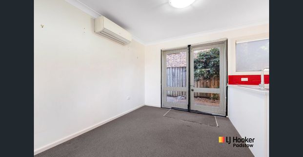 Spacious Two-Bedroom Townhouse in Peaceful, Convenient Location - Photo 1