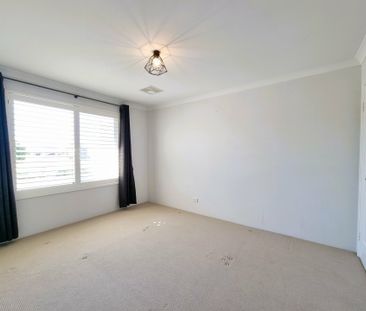 Spacious Family Living in a Prime Harrisdale Location - Photo 4