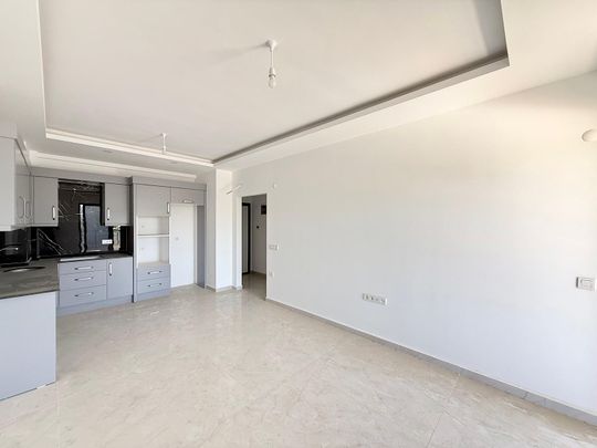 Lägenhet i Komplex med Bekvämligheter nära Stranden i Alanya - Photo 1