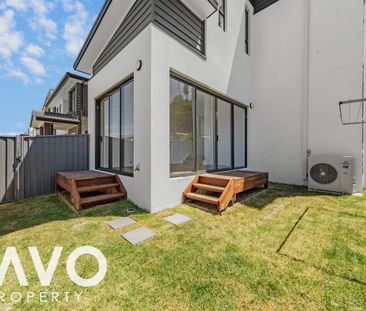 Modern two story home features lower ground - Photo 5