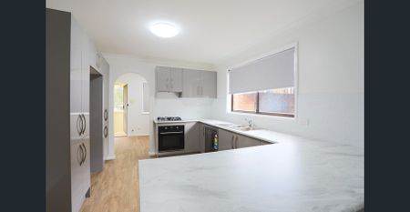 Modern Comfort Meets Low-Maintenance Living – 3 Bedroom Renovated Home - Photo 4