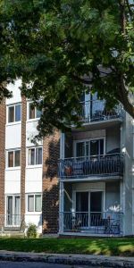 Coquet 4 1/2 3e étage tout béton - eau chaude + chauffage inclus - MARS ou JUILLET - Photo 4