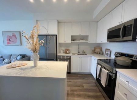 Unit 114- Beautifully Designed/ 2 Bedrooms Plus Den Condo at The Grove - Photo 2