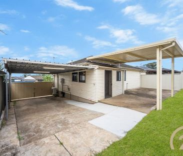 Well-Kept Family Home in a Convenient Location! - Photo 1