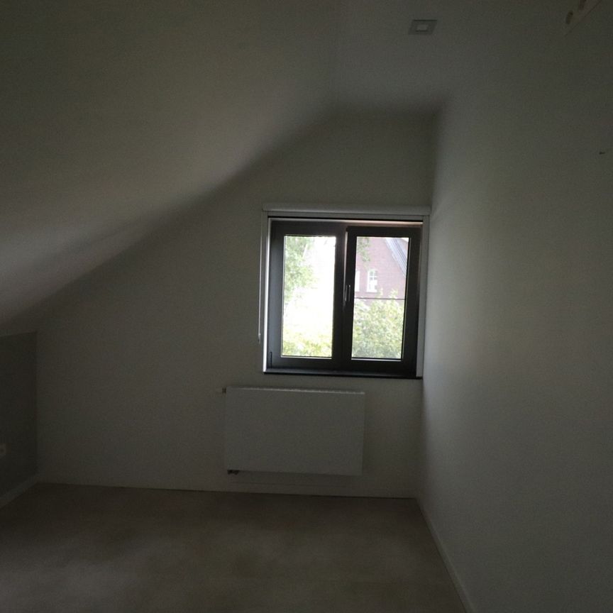 Modern en energiezuinig 2-slaapkamerappartement met carport en ruim terras. - Foto 1