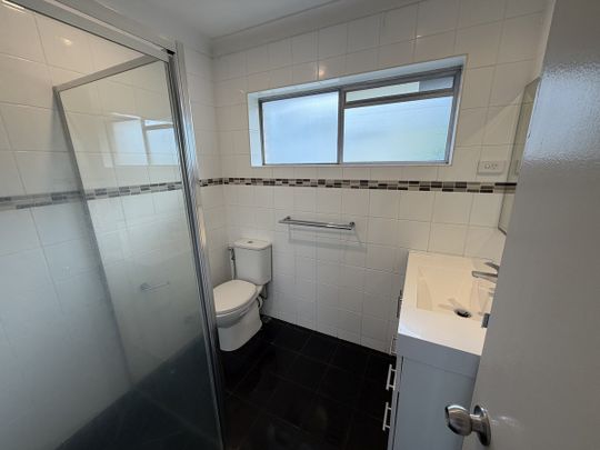 Relaxed Urban Living: Light-Filled 2-Bedroom Unit - Photo 1