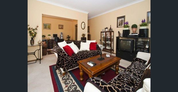 TWO BEDROOM, TWO BATHROOM COURTYARD STYLE HOME - Photo 1