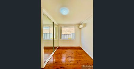 Bright & Spacious Family Home in Sought-After Girraween Location - Photo 4