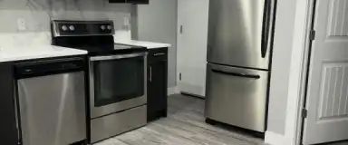 2 Bedroom + Den & 1 Bath -Legal Suite with Wifi Included | Cityside Green NE, Calgary - Photo 1