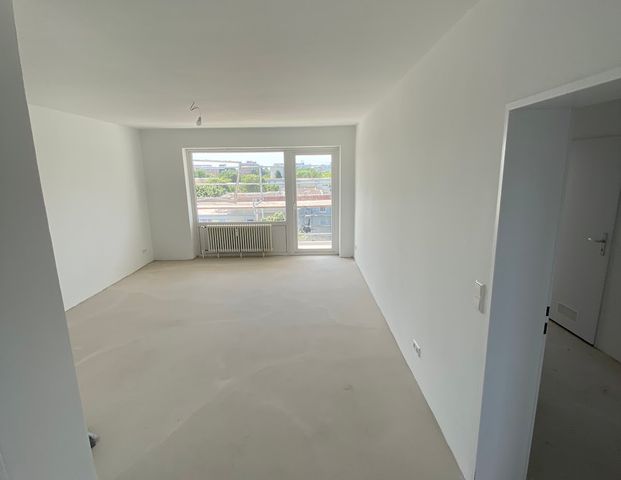 Dachgeschosswohung mit Weitblick 3-Zimmer // DG, rechts - Foto 1