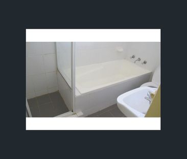 Spacious top floor Unit - Photo 6