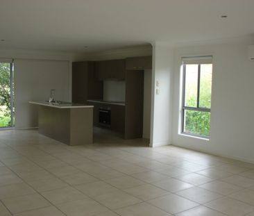 4 BEDROOM MODERN FAMILY HOME WITH ENSUITE DOUBLE GARAGE AND QUIETLY... - Photo 1