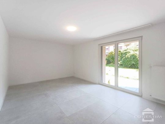 Superbe appartement 3.5pces avec jardin - Photo 1