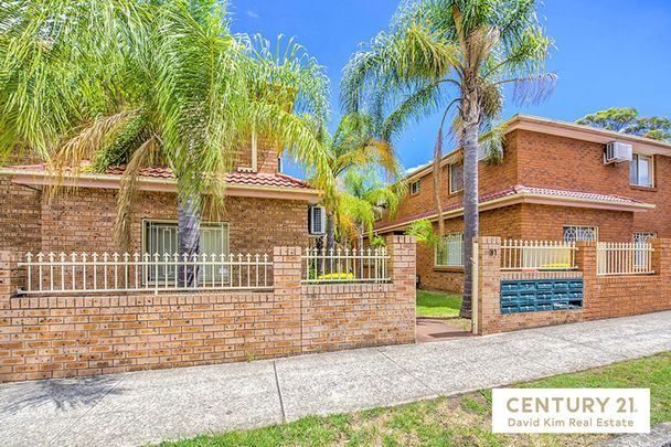 Secure & Bright Two Bedroom Townhouse with Double Garage - Photo 1