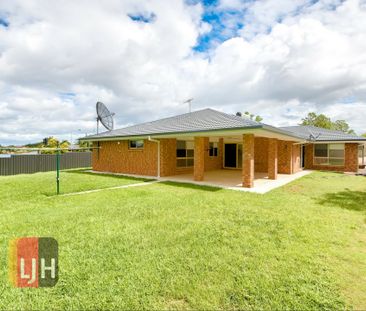 SPACIOUS, 4 BEDROOM HOME WITH DUCTED AIR CONDITIONING! - Photo 2