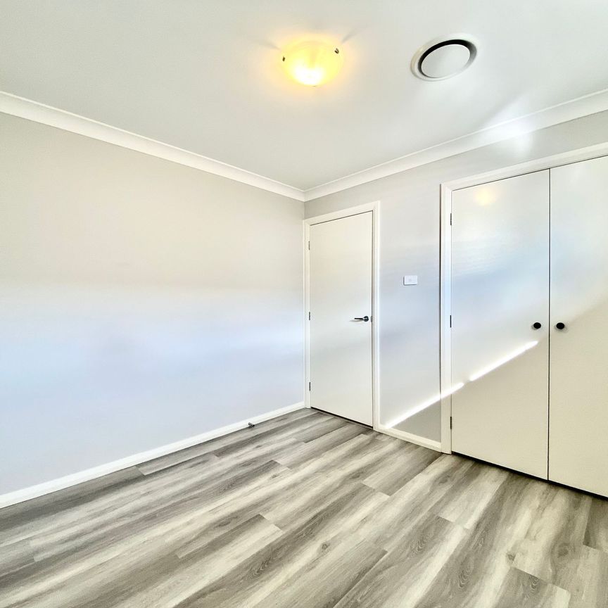 Elegant Family Living in Prestigious Oran Park! - Photo 1